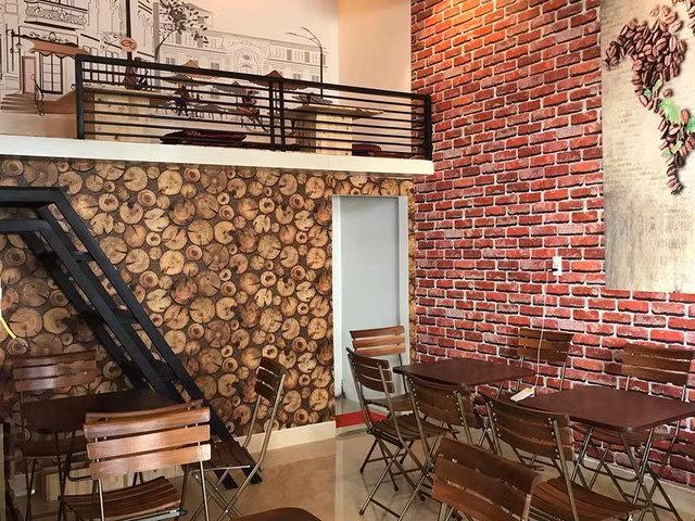 Đây là ý tưởng của Công Phượng bởi anh muốn hương vị cafe quyện trong quán và nó phải mang đến sự gần gũi, bình dân. Ảnh: Cafebiz.