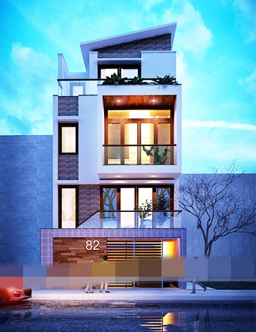 Nhà ống khang trang có gara để xe và sử dụng lan can kính hiện đại. Ảnh: Housevn.