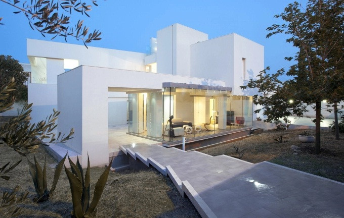 Ngôi nhà như một không gian mở đầy cảm hứng và hài hòa với khung cảnh xung quanh. Ảnh: Homedesign.