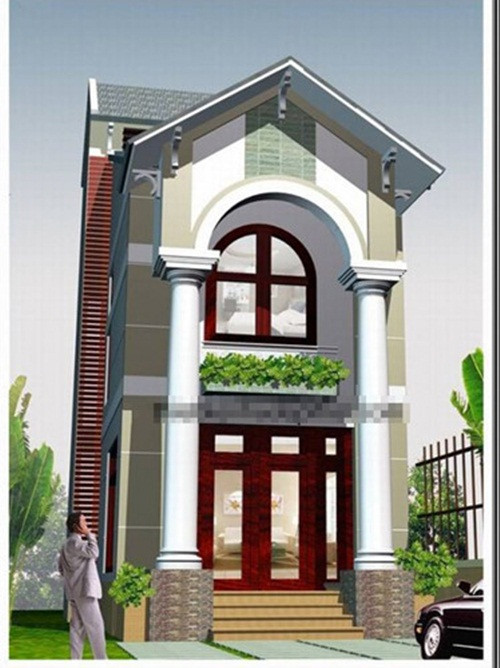Nhà 2 tầng mái thái kiểu dáng đơn giản được xây trên tổng diện tích đất 65m2. Đơn giản nhưng kiến trúc rất vững chắc với hai chiếc cột trụ to phía trước. Ảnh: Thietkenhadepmoi.