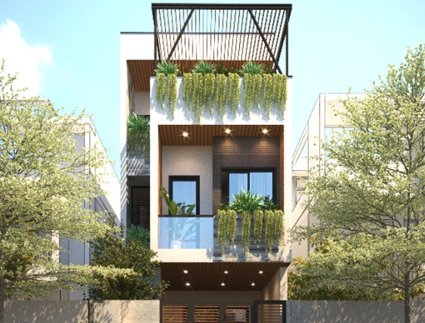 Nhà ống 2 tầng có kết cấu đơn giản, hình dáng vuông vức. Các mảng tường được tạo hiệu ứng lồi lõm làm tăng cảm giác về chiều sâu. Ảnh: Hoangphu.