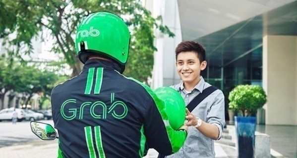 Grab áp dụng chính sách thưởng bằng cách đặt các mốc điểm tương ứng để xét thưởng cho tài xế. Tại TP HCM, Grab chia mốc điểm nhận thưởng là: 250 (30.000 đồng), 450 (60.000 đồng); 600 (180.000 đồng), 800 (280.000 đồng) và 900 (360.000 đồng). Ảnh: Grab.