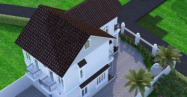 Nhà 2 tầng 100m2 đẹp hơn nhờ chút nắng cho mái ngói nâu đỏ và tiểu cảnh mặt tiền trước. Ảnh: Vinatrends.