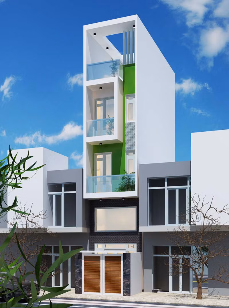 Nhà 3 tầng nổi bật với các mảng miếng vuông và chữ nhật đơn giản đặc trưng của phong cách hiện đại. Ảnh: Arcviet.