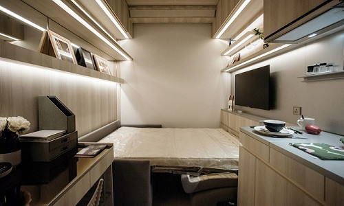 Đó cũng là lý do xuất hiện hàng loạt căn hộ siêu nhỏ ở Hong Kong. Ảnh: Bloomberg.