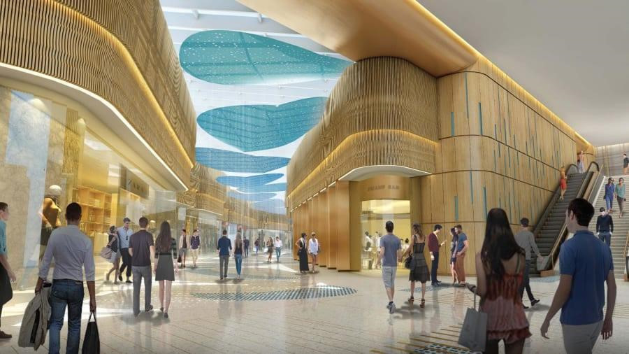 Hành lang lớn bao gồm nhiều gian hàng bán lẻ với các mặt hàng đa dạng phục vụ du khách.