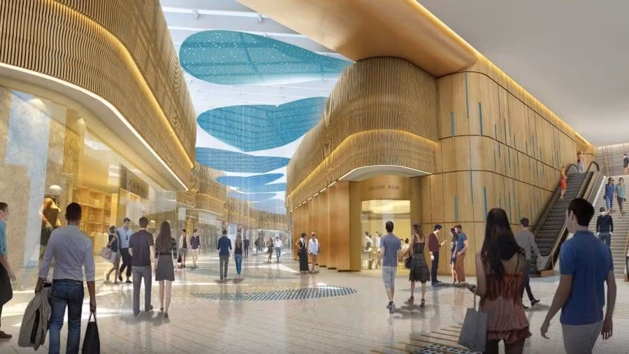 Hành lang lớn bao gồm nhiều gian hàng bán lẻ với các mặt hàng đa dạng phục vụ du khách.