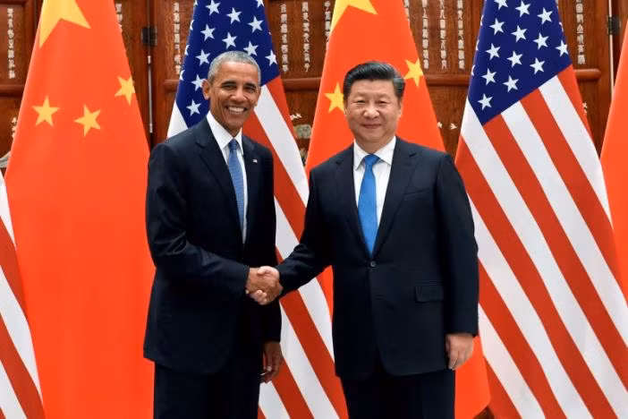 Chủ tịch Tập Cận Bình vui vẻ bắt tay Tổng thống Obama trong cuộc gặp gỡ ở Nhà khách chính phủ tại thành phố Hàng Châu, nơi sẽ diễn ra Hội nghị Thượng đỉnh G20.