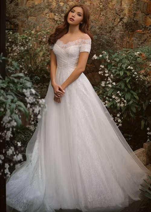 Mỗi lần hóa cô dâu, Minh Tú đều "đốn tim" người hâm mộ. Ảnh: Dân Việt