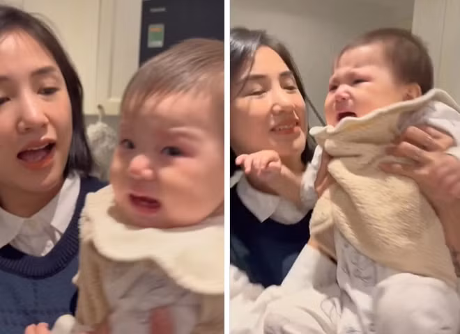 Khoảnh khắc bé Pam khóc và giãy dụa ra khỏi mẹ làm nhiều người thích thú.
