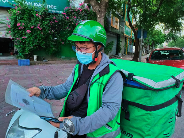 “Dong bang” Grab, Be, Go-jek, shipper... soi cuoc song tai xe xe cong nghe-Hinh-2