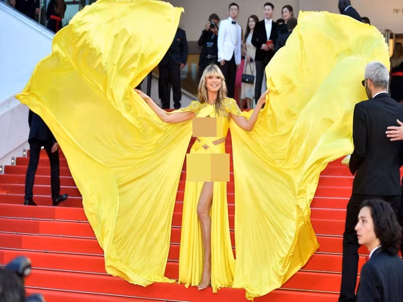 Siêu mẫu Heidi Klum mặc táo bạo ở Liên hoan phim Cannes. Ảnh: Harper's Bazaar.