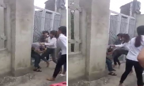 Nam thanh nien bi nu sinh danh hoi dong giua duong