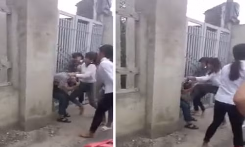 Nam thanh nien bi nu sinh danh hoi dong giua duong