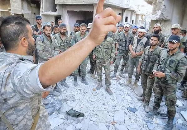 Sau khi giành lại quyền kiểm soát nhiều tòa nhà ở Tam giác Ayn Tarma, lực lượng chính phủ Damascus cần quân tiếp viện để củng cố căn cứ trong khu vực. Ảnh: FNA.