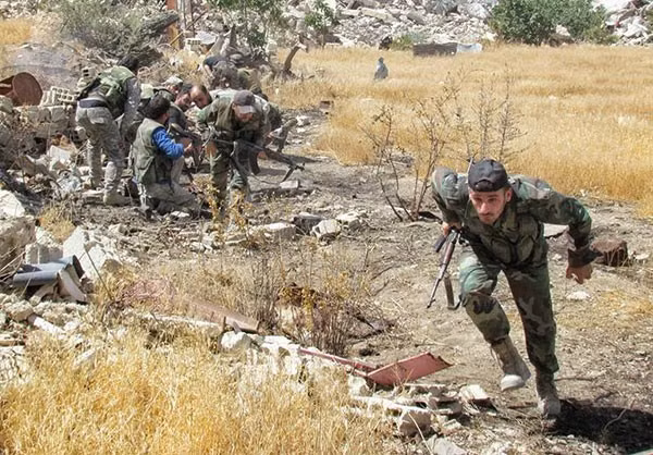 “Lực lượng chính phủ Damascus đã giành lại quyền kiểm soát gần như toàn bộ các tòa nhà trông xuống trạm xăng chiến lược Sanabel”, phóng viên Ibrahim Joudeh cho hay. Ảnh: FNA.