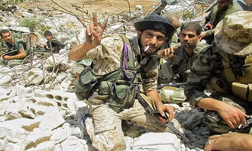 Binh sĩ Syria lạc quan trên chiến trường. Ảnh: FNA.