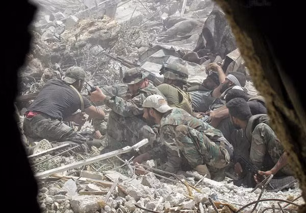 Các binh sĩ Syria trên chiến trường. Ảnh: FNA.