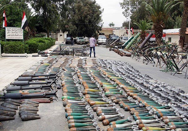 Theo South Front, hôm 10/5, phiến quân HTS, Jaysh al-Islam và Jaysh al-Ababil đã rời khỏi bốn quận Aqraba, Beit Sahm, Yalda và Babbila phía nam thủ đô Damascus theo thỏa thuận đạt được với chính phủ Syria. Ảnh: FNA.