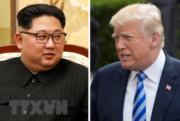 Tổng thống Mỹ Donald Trump (phải) và nhà lãnh đạo Triều Tiên Kim Jong-un. (Nguồn: EPA/TTXVN)