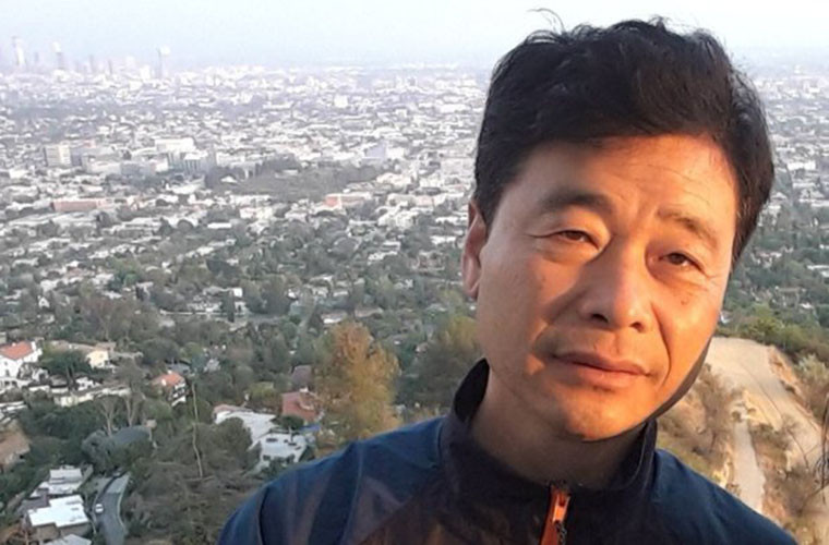 Được biết, Kim Hak Song là một chuyên gia về nông nghiệp, giảng dạy việc trồng lúa tại Đại học PUST. Ông từng học Đại học tại California, Mỹ. Ảnh: WSJ.