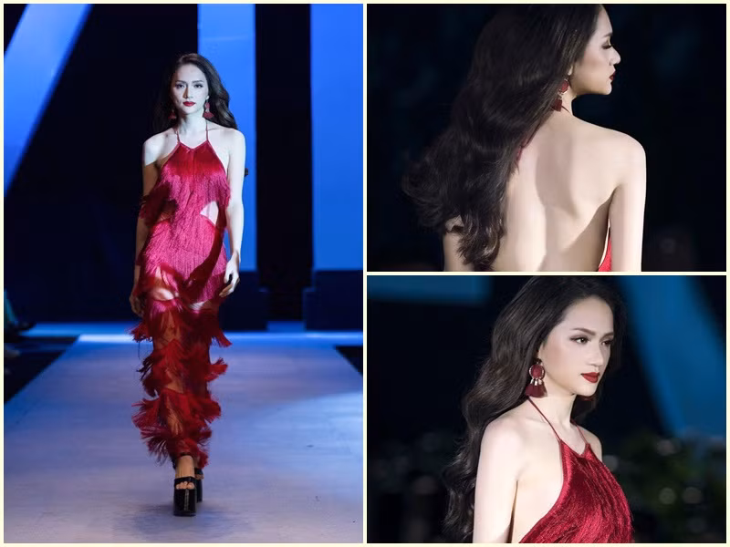 Váy áo tông màu đỏ làm tôn lên làn da trắng mịn màng của Hương Giang.