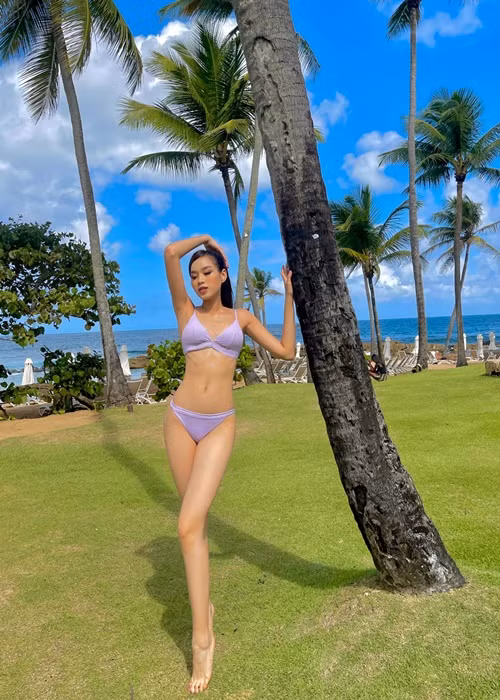 Do Thi Ha khoe voc dang goi cam voi bikini o Miss World