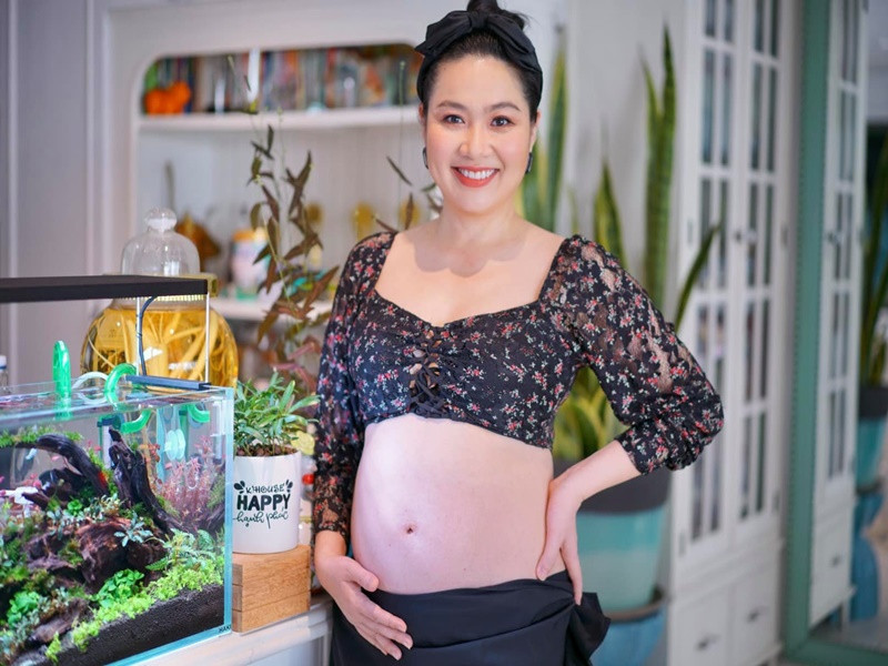 Lê Khánh gọn hơn lần mang bầu đầu tiên vì tập yoga trước khi có thai lần 2.