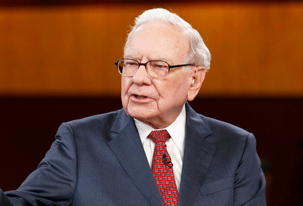Ty phu Warren Buffett day con tiet kiem tien nhu the nao?