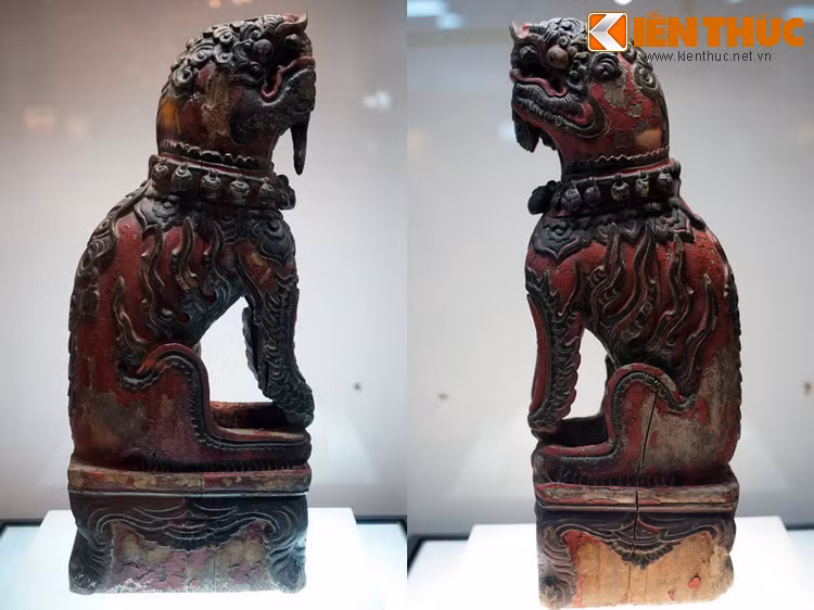 Tượng nghê chầu bằng gỗ sơn thiếp, thời Lê Trung Hưng, thế kỷ 17 – 18. Là con vật canh giữ về mặt tinh thần, chống lại các ác quỷ... Nghê luôn được đặt thành một cặp trước lối vào các công trình quan trọng với cộng đồng như cổng làng, cổng đình và các cung điện, biệt phủ xưa.