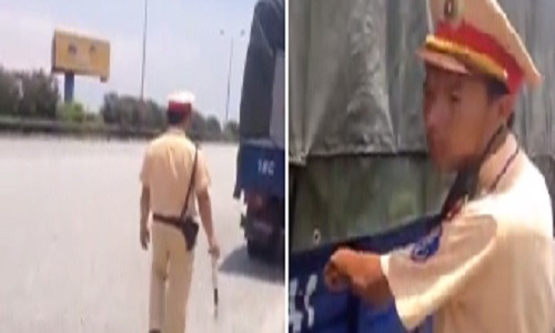 Cuc CSGT len tieng viec bat loi tai xe dan bien so cong