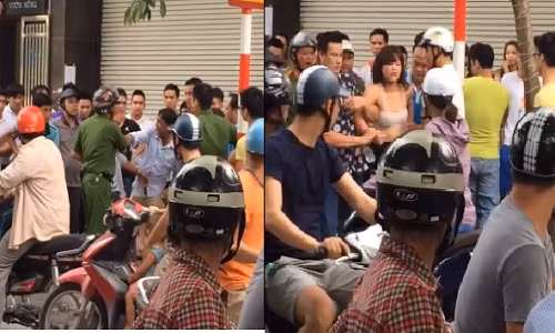 Sự việc xảy ra khiến nhiều người dân hiếu kỳ kéo nhau đến xem rất đông. Ảnh cắt từ clip.