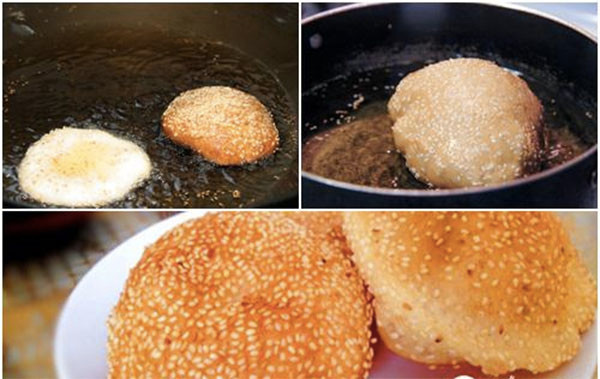 Cho tất cả bột đã làm vào một thau nhỏ, dùng khăn ẩm bọc kín bên trên và ủ bột nơi kín gió trong 1-2 tiếng. Đợi cho đến khi bột nở gấp đôi. Tiến hành chia bột thành từng phần đều nhau, mỗi phần vừa đủ cho một cái bánh tiêu, vo tròn lại, lăn đều qua mè trắng. Ảnh: momkitty.com.