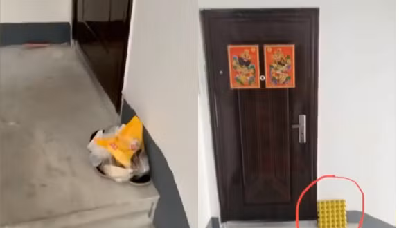 Đi công tác về, "cảm kích" khi thấy hàng xóm vứt rác trước nhà Di cong tac ve,