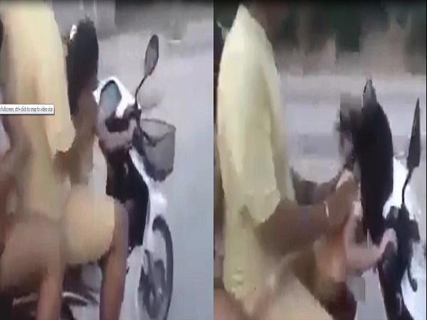 Cả gia đình để bé gái 3 tuổi lái xe trên vun vút trên đường. Ảnh cắt từ clip