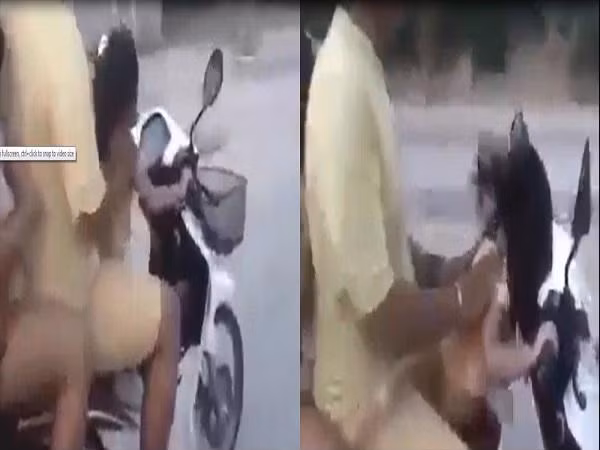 Cả gia đình để bé gái 3 tuổi lái xe trên vun vút trên đường. Ảnh cắt từ clip