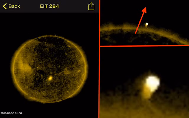 Nghi UFO co Trai dat an hien trong khi quyen Mat troi