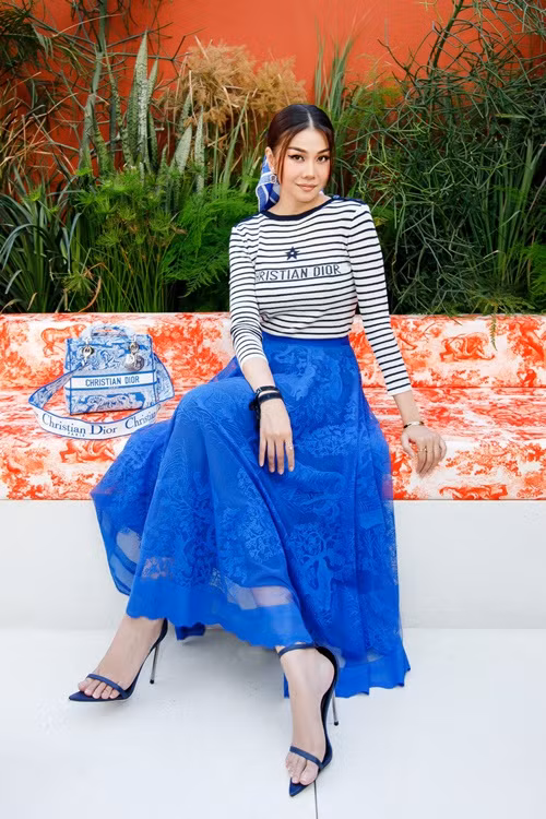 Thanh Hằng phủ lên mình những bộ trang phục hàng hiệu. Ảnh: FBNV.