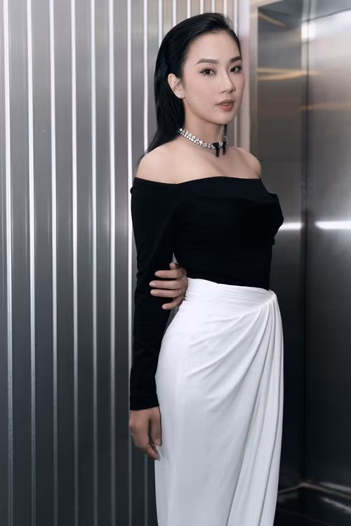 Người đẹp sinh năm 1990 lấy lại vóc dáng thon gọn sau 1 năm có con. Ảnh: FBNV.