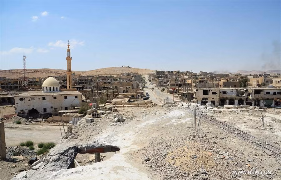 Quang cảnh đổ nát ở thị trấn al-Sukhnah hôm 13/8. Ảnh: THX.