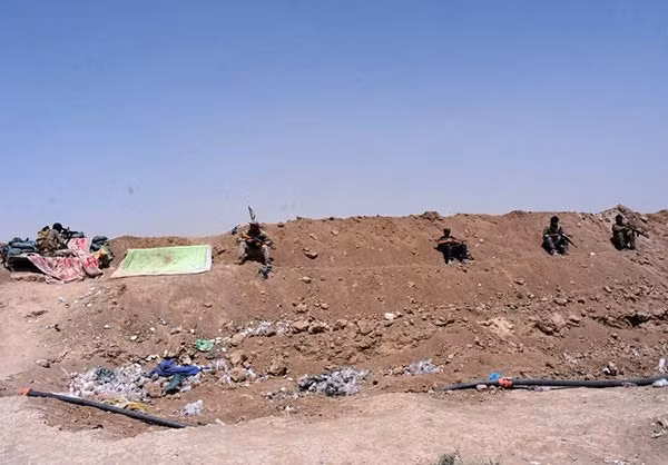 “Các ngươi (IS) chỉ có hai con đường: Đầu hàng hoặc chết”, Thủ tướng Iraq Haider al-Abadi tuyên bố trong bài phát biểu trên truyền hình. Ảnh: FNA