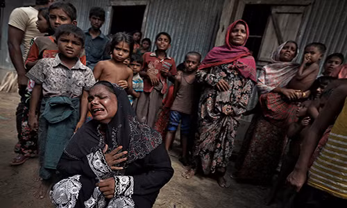 Người tị nạn Rohingya đau lòng trong đám tang của người thân ở Cox’s Bazar, Bangladesh, ngày 29/9/2017. Ảnh: The Atlantic.