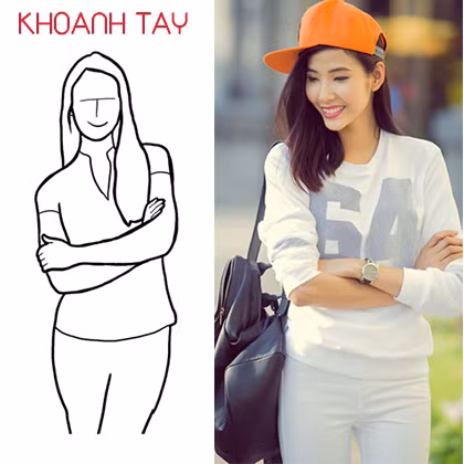 Phong cách mạnh mẽ với kiểu khoanh tay. 