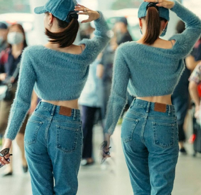 Cô cũng chọn buộc tóc đuôi ngựa năng động, phù hợp với tổng thể set đồ thay vì những kiểu tóc cầu kỳ thường gặp.