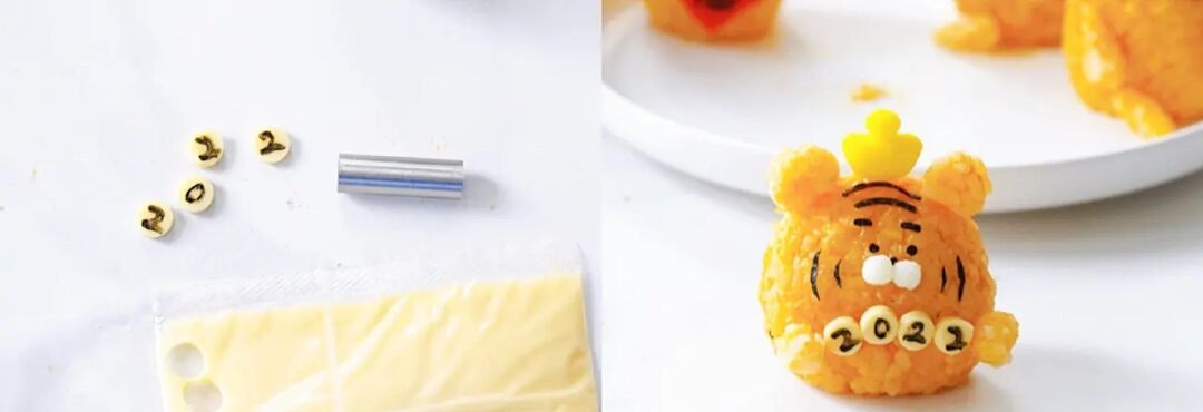 Bước 3: Nặn tay cho hổ, dùng khuôn tạo hình có ghi số 2022 rồi đính lên tay hổ.