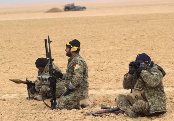 Các thành viên lực lượng Iraq trên chiến trường đánh IS ở Mosul. Ảnh: FNA.