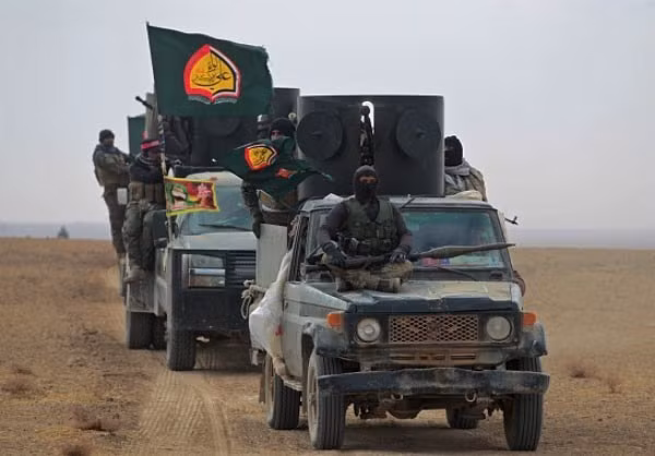 Đoàn xe của lực lượng Iraq ở Mosul. Ảnh: FNA.