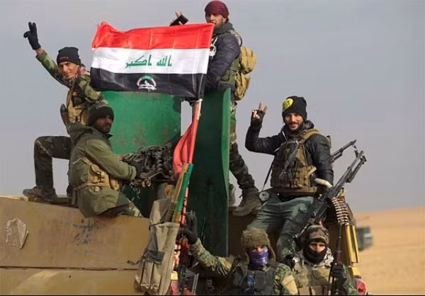 Giao tranh ác liệt giữa các lực lượng Iraq và phiến quân IS diễn ra tại các ngôi làng phía nam thành phố Tal Afar, vùng ngoại ô phía tây thành phố Mosul. Ảnh: FNA.