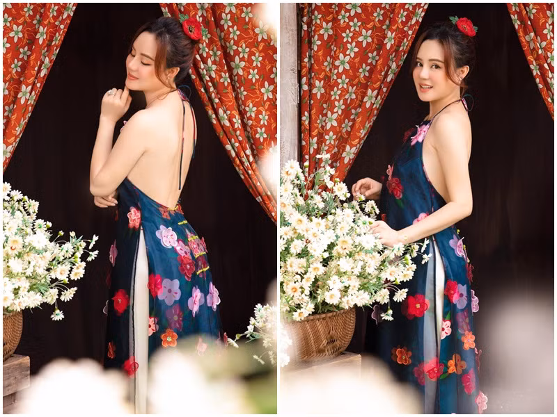 Trong thời gian đầu mang thai, Vy Oanh chưa tăng cân quá nhiều. Trong ảnh, nữ ca sĩ sinh năm 1985 khoe vẻ gợi cảm khi đón Tết Nguyên Đán 2021.