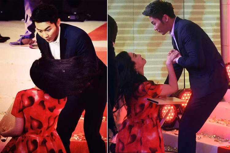 Tháng 6/2015, tại Liên hoan Phim Quốc tế Thượng Hải lần thứ 18, Phạm Băng Băng bước hụt chân trên sân khấu, Lý Thần vội vàng đỡ người yêu lên. Hình ảnh tình tứ của cặp đôi khiến nhiều người phát ghen. Ảnh: Sina